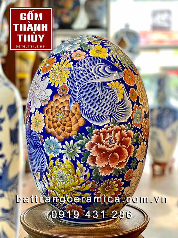 Trứng sứ phong thủy cá rồng phú quý cao 45cm